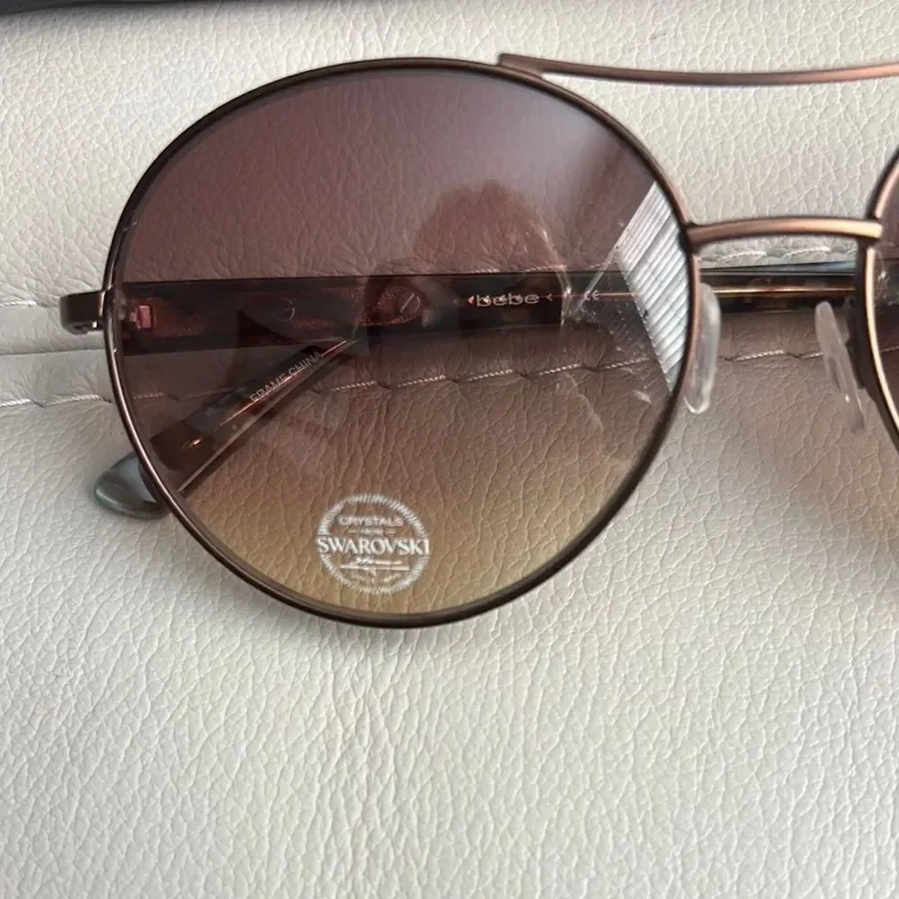 Bebe Round Sunglasses with Swarovski Crystals